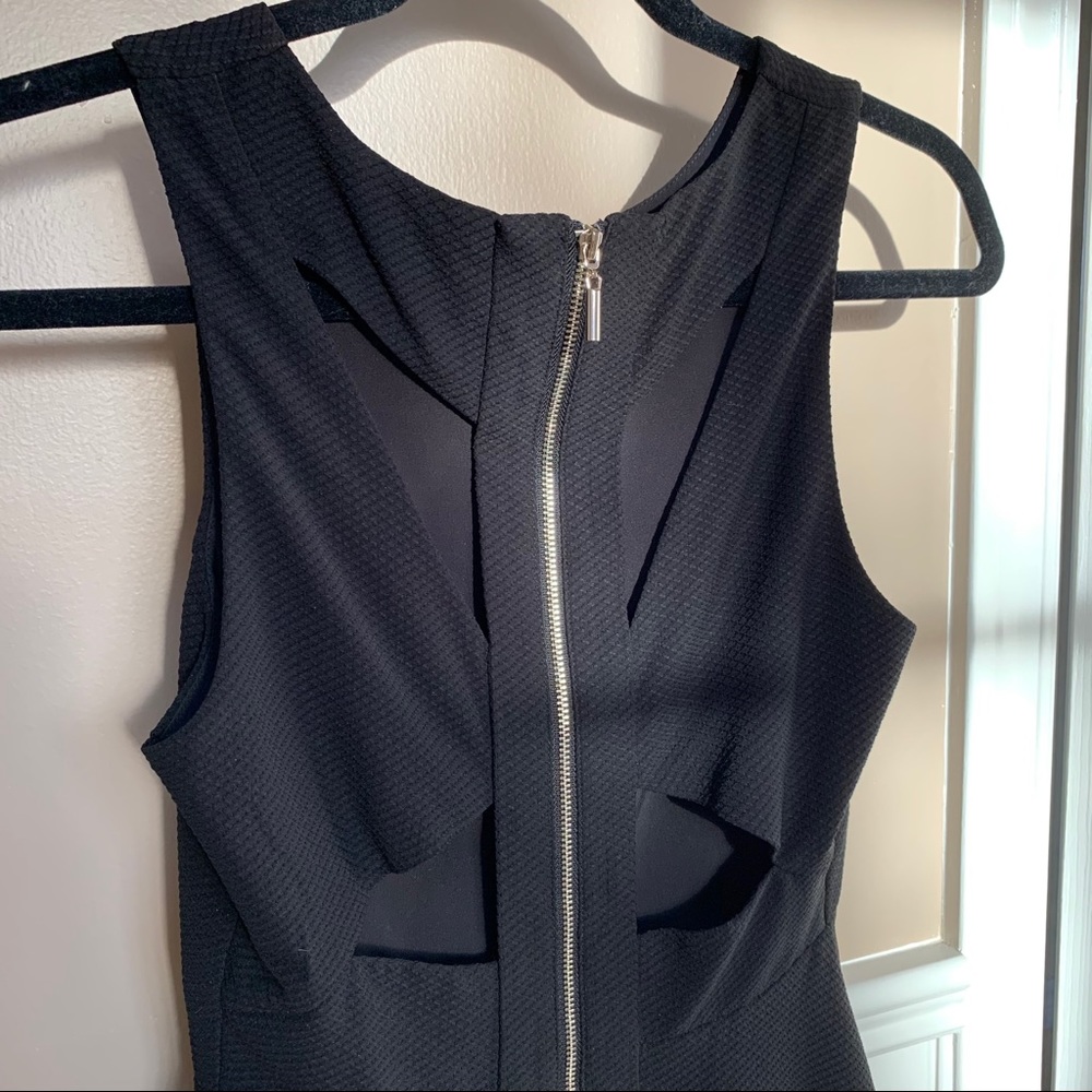 Black peplum top, with back cutouts - Picture 6 of 6